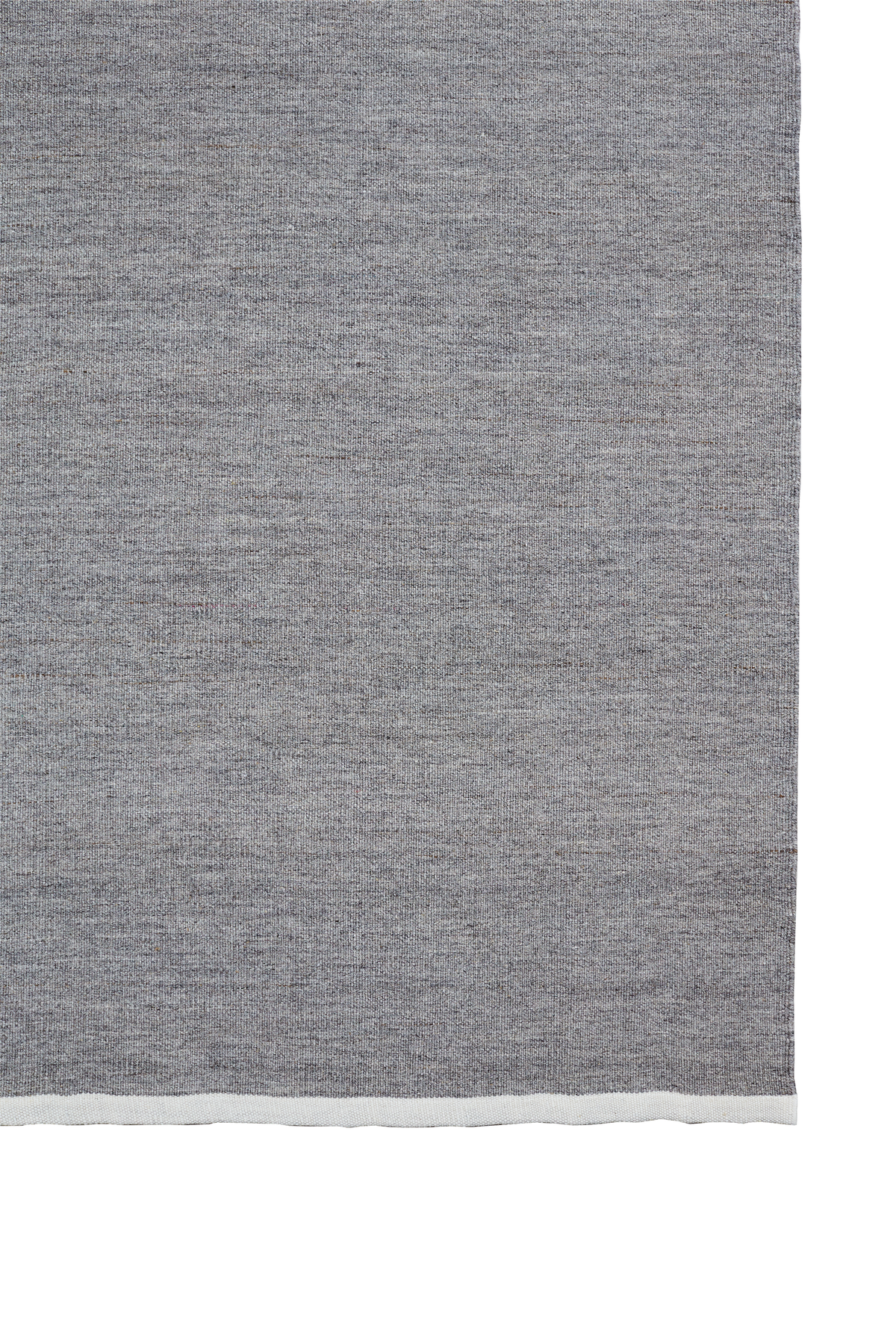 Massimo Escape Kelim Stone tapis plat gris, vue d'ensemble avec la bande contrastée en bout