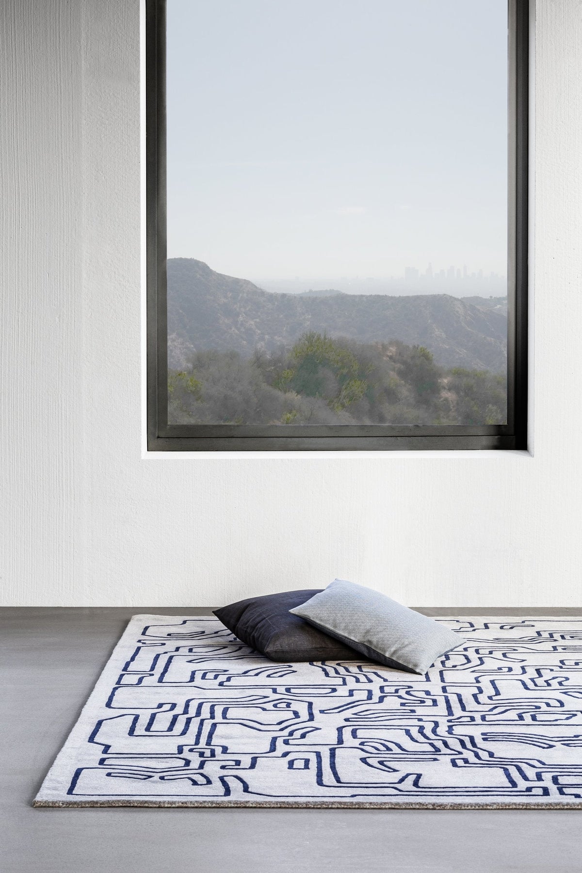 Massimo Structures Fragment 2 tapis bleu, dans un intérieur